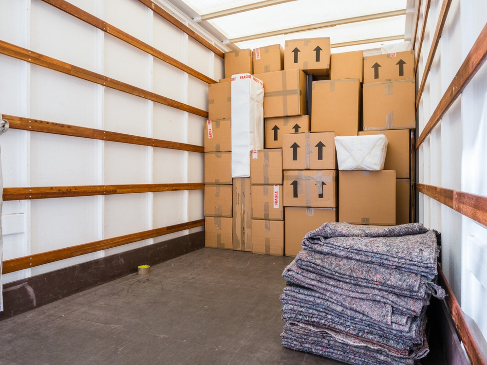 Boxes stacked in the inside of a moving truck