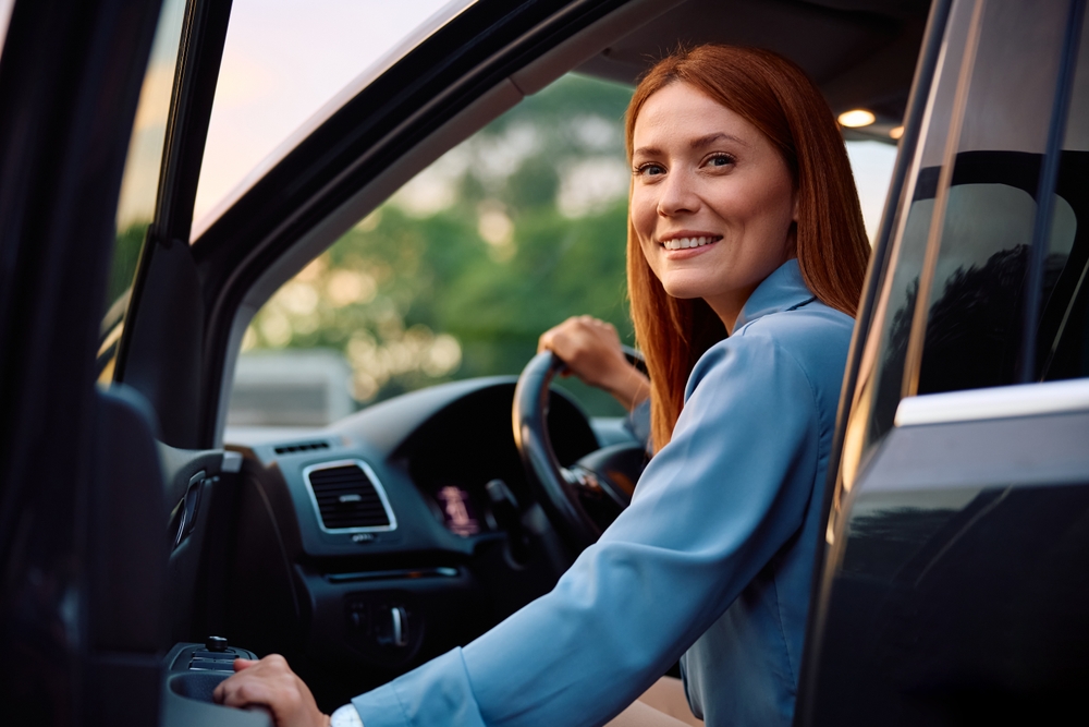 A woman dropping her car off for vehicle storage
